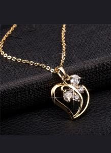 Pendentif en forme de cœur et de papillon en or jaune 18 carats