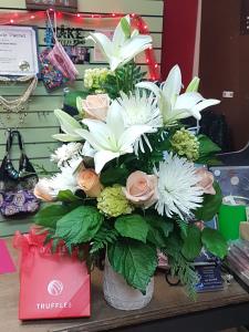 All in white peaches and greens with chocolates –  Trail Florist Incorporated, Trail BC